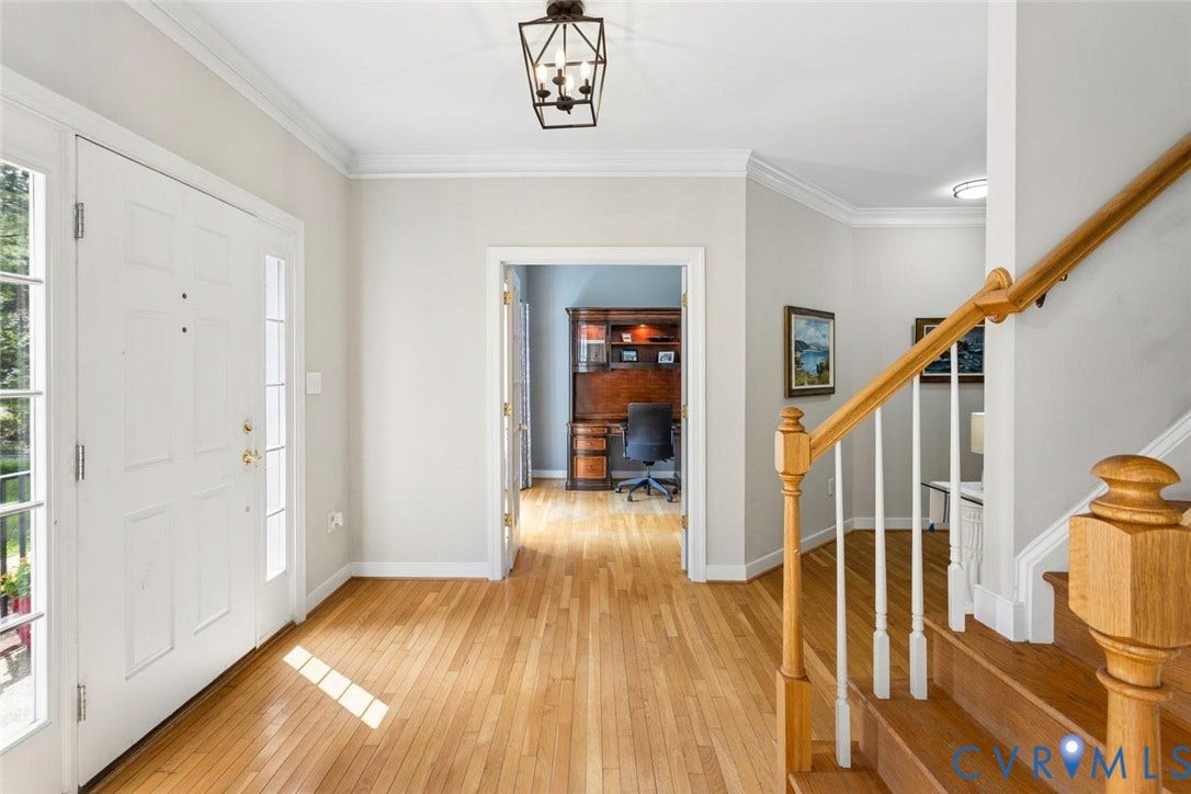 6001 Olde Hartley Place, Glen Allen, VA 23060 Entryway with light wood-finish flooring, white paneled door with sidelights, and a decorative lantern-style light fixture