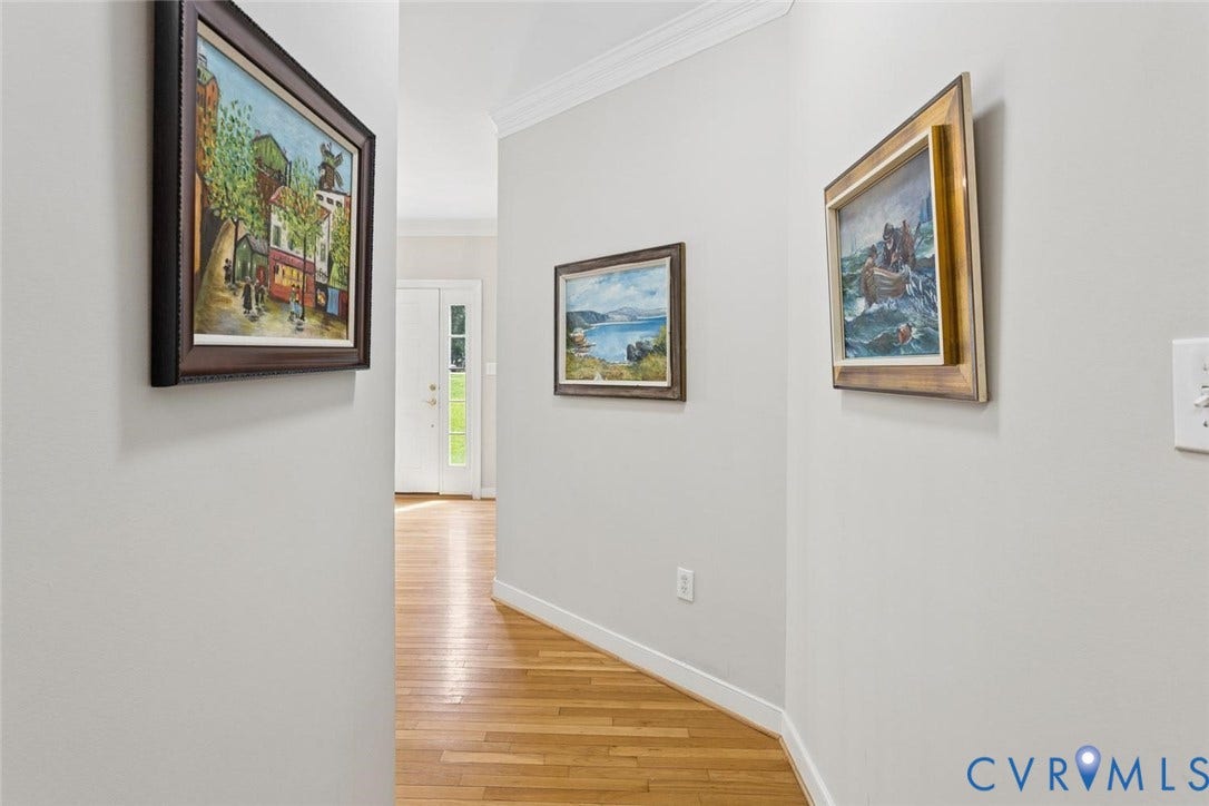 6001 Olde Hartley Place, Glen Allen, VA 23060 Hardwood flooring, painted walls, crown molding, and a double exterior door