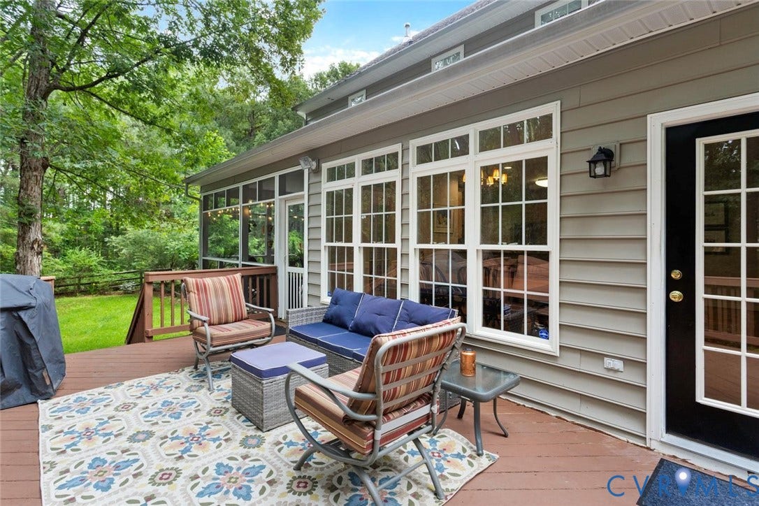 6001 Olde Hartley Place, Glen Allen, VA 23060 Wood deck with a screened-in porch, multiple pane windows, and a black exterior door