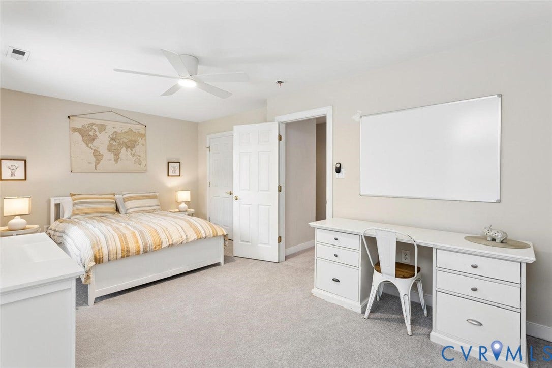 6001 Olde Hartley Place, Glen Allen, VA 23060 Recessed lighting and a ceiling fan fixture illuminate the room