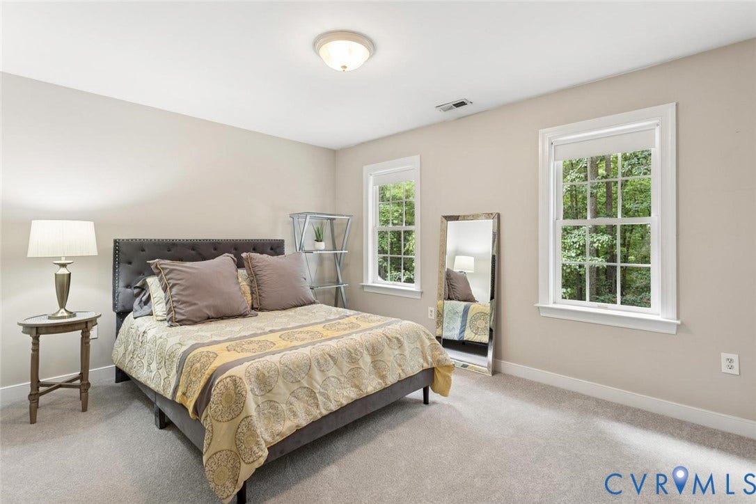 6001 Olde Hartley Place, Glen Allen, VA 23060 Neutral-toned walls complement plush carpeting