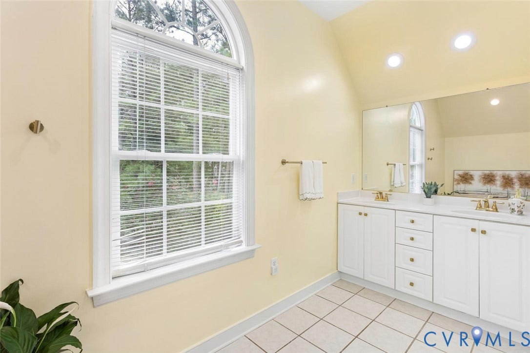 6001 Olde Hartley Place, Glen Allen, VA 23060 Dual vanity with white cabinetry and gold-tone hardware