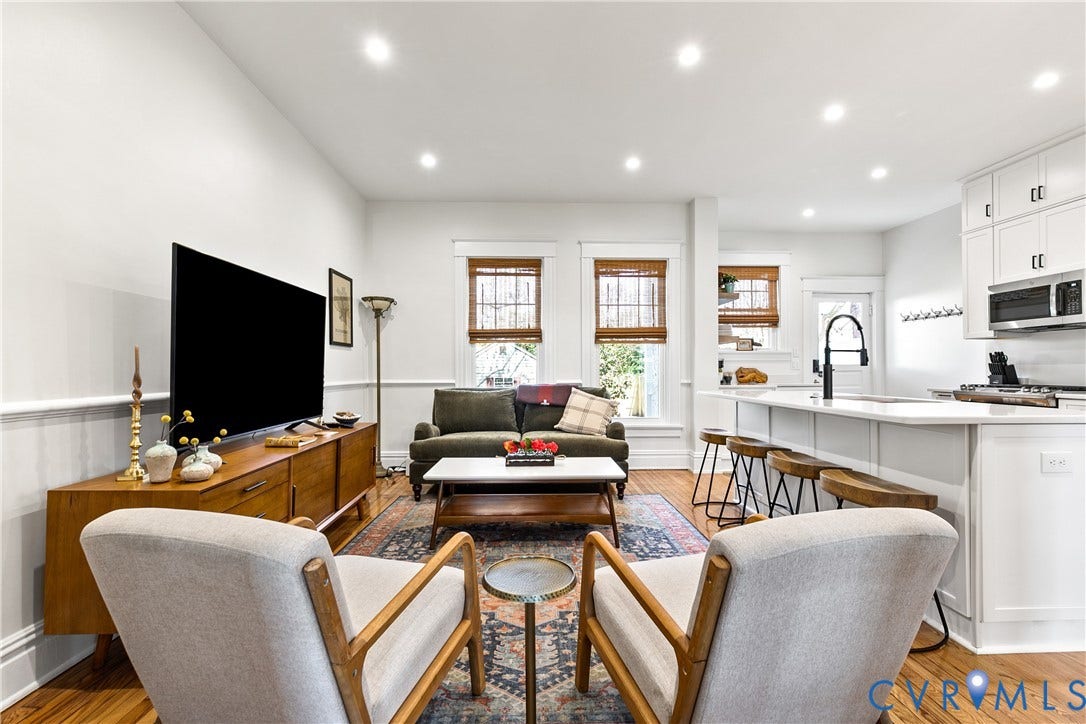 3142 Floyd Avenue, Museum District, Richmond, VA 23221 Open-concept living space with hardwood flooring, recessed lighting, white wainscoting, and white baseboards