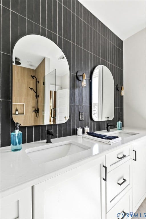 3142 Floyd Avenue, Museum District, Richmond, VA 23221 Dual vanity with integrated sinks and white countertops