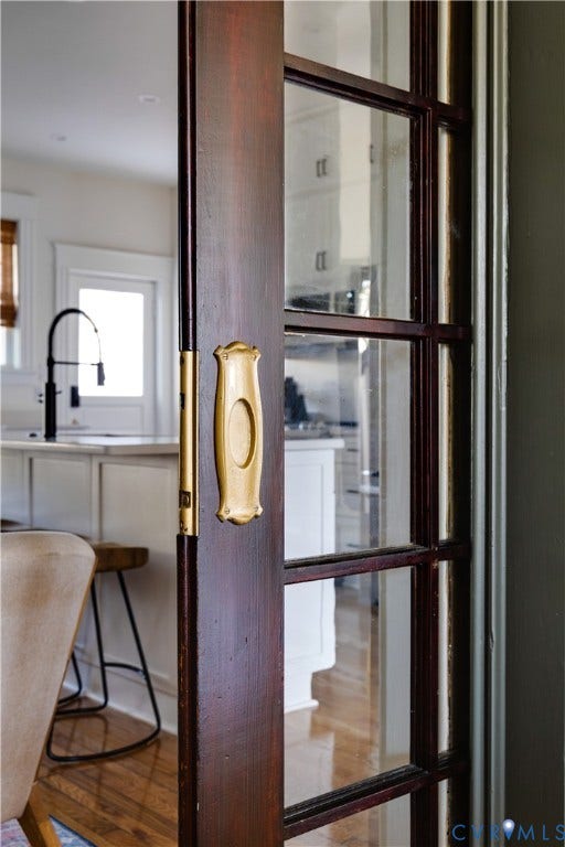 3142 Floyd Avenue, Museum District, Richmond, VA 23221 Dark wood-finish French door with gold-tone hardware