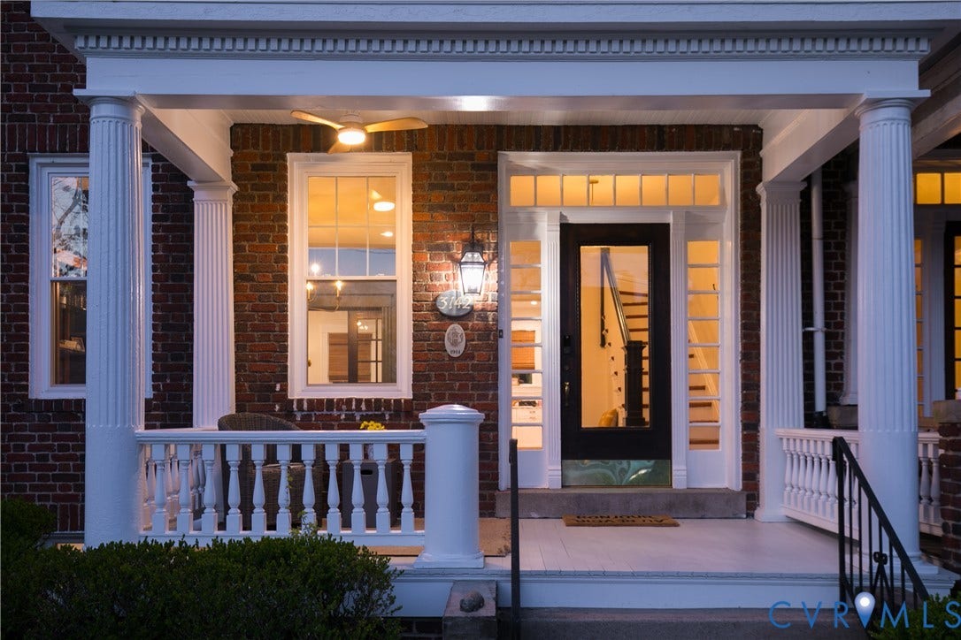 3142 Floyd Avenue, Museum District, Richmond, VA 23221 Brick facade with a covered front porch featuring white columns and balusters
