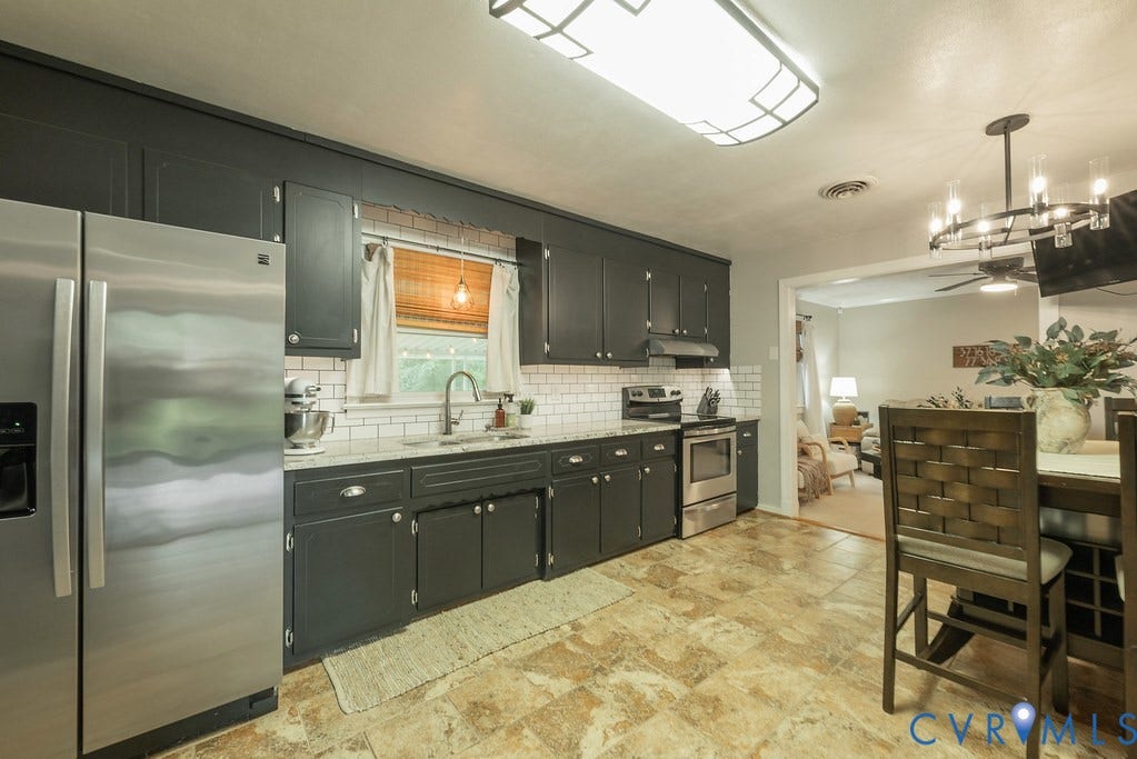 Stainless appliances and upgraded lighting