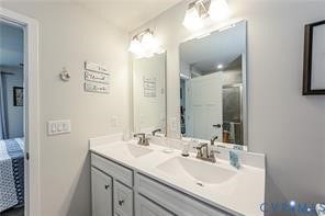7225 Lyon Taylor Lane, The Groves At New Kent, New Kent, VA 23124 Dual vanity with white countertop, undermount sinks, and brushed nickel fixtures