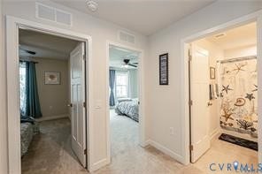 7225 Lyon Taylor Lane, The Groves At New Kent, New Kent, VA 23124 Hallway featuring light-colored walls and carpet flooring