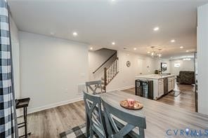 7225 Lyon Taylor Lane, The Groves At New Kent, New Kent, VA 23124 Open-concept main living area with wood-finish flooring throughout