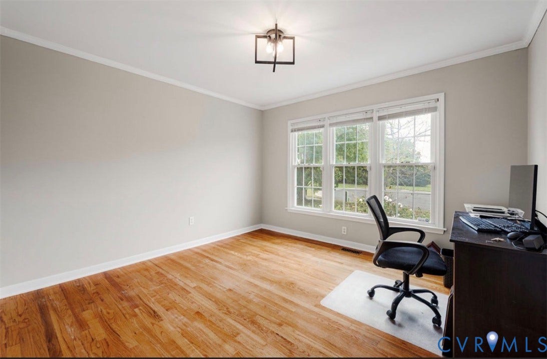 2912 Appleford Drive, Longmeadow, Chester, VA 23831 Wood-finish flooring, white trim, rectangular window frames, and a flush-mount light fixture