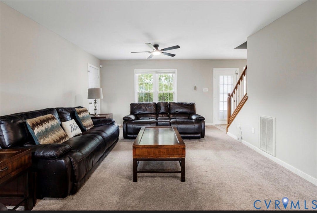 2912 Appleford Drive, Longmeadow, Chester, VA 23831 Carpeted flooring with painted walls, ceiling fan with light fixture, and a staircase with wood handrails