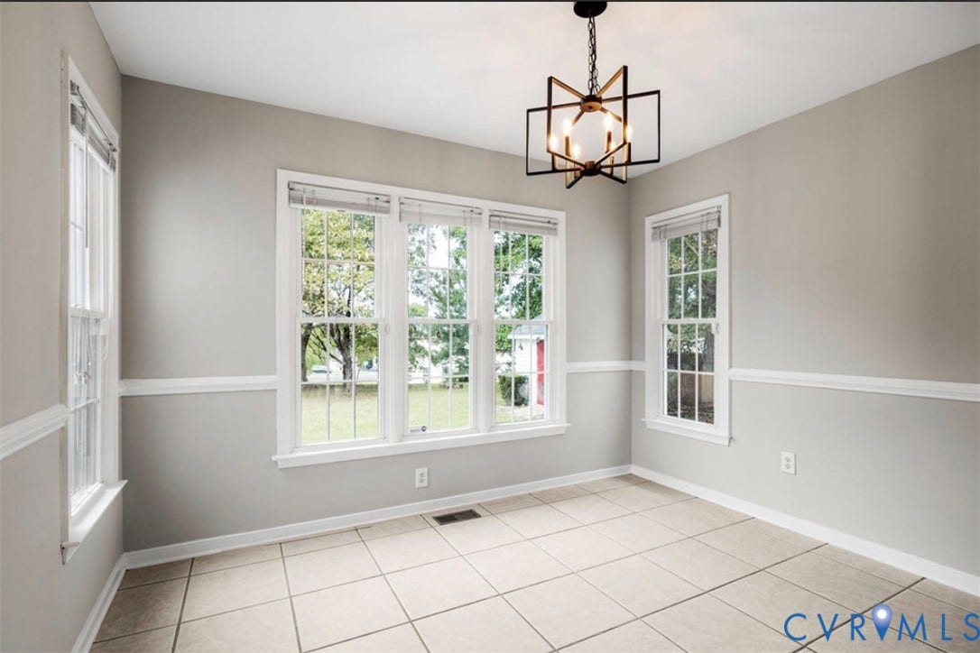 2912 Appleford Drive, Longmeadow, Chester, VA 23831 Spacious room with tiled flooring and a geometric chandelier