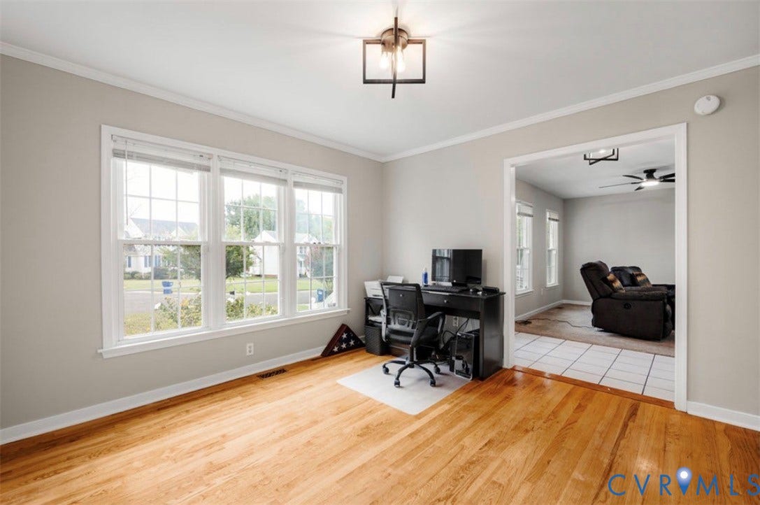 2912 Appleford Drive, Longmeadow, Chester, VA 23831 Wood-finish flooring with crown molding and a contemporary ceiling fixture