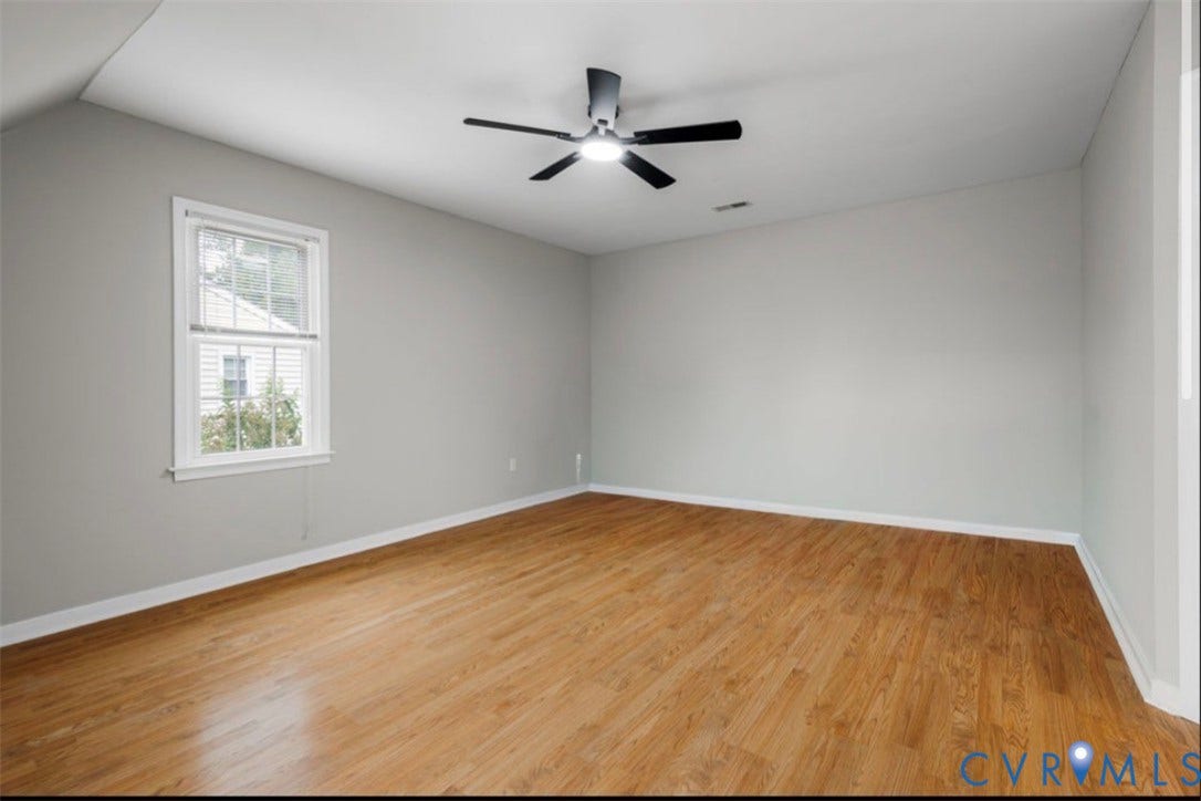 2912 Appleford Drive, Longmeadow, Chester, VA 23831 Hardwood-style flooring, white trim, a double-hung window, and a ceiling fan with integrated lighting