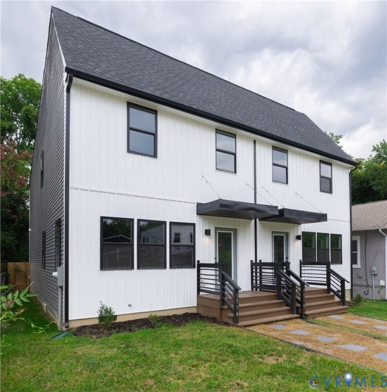 1514 Custer Street, Richmond, VA 23222 Contemporary duplex exterior featuring white vertical siding and black-framed windows