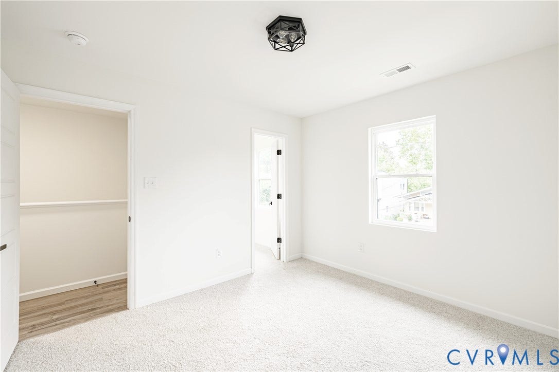 1514 Custer Street, Richmond, VA 23222 Bedroom featuring light-toned carpeting, white walls, and a single window