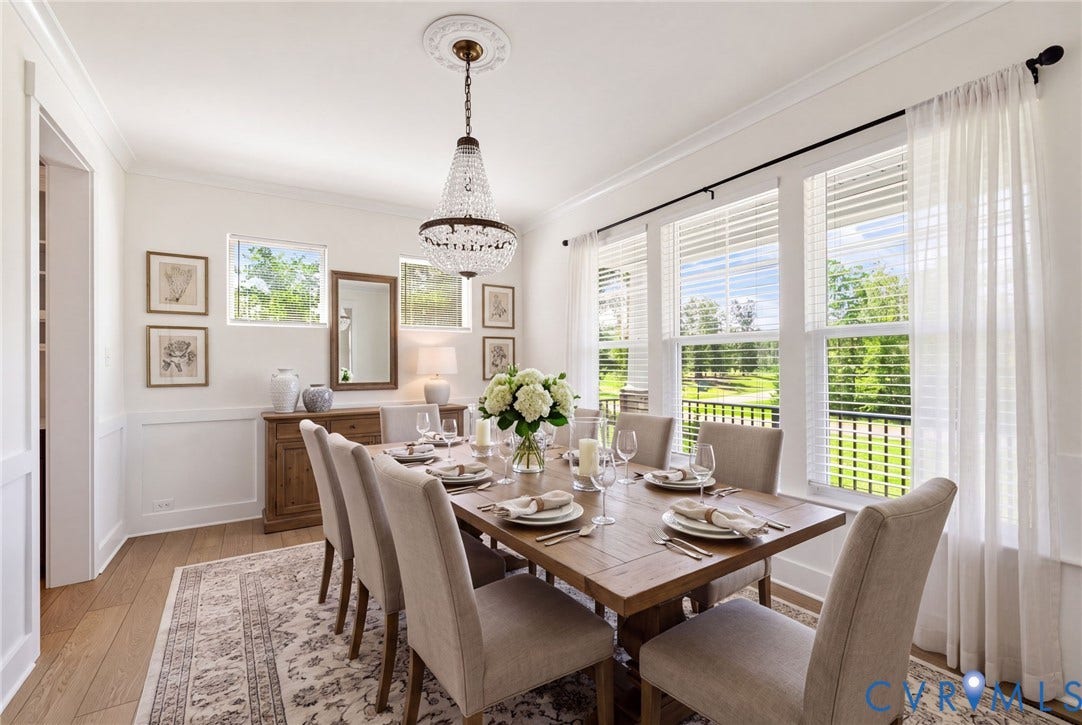 **Virtually Staged** Wood-finish flooring, wainscoting, and crown molding