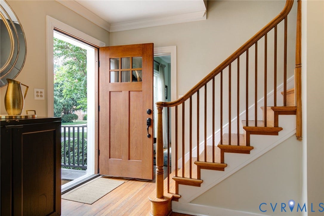 14 Libbie Avenue, Libbie/Grove, Richmond, VA 23226 Entryway featuring a wood-finish front door with glass lites, hardwood flooring, and a wood-finish staircase with balusters