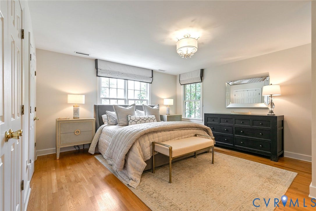 14 Libbie Avenue, Libbie/Grove, Richmond, VA 23226 Bright bedroom featuring wood-finish flooring, two window units, and a semi-flush mount ceiling light fixture