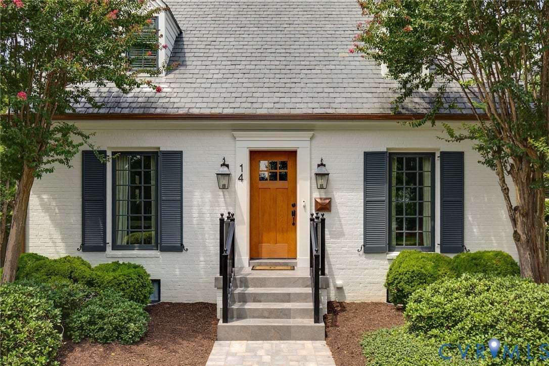 14 Libbie Avenue, Libbie/Grove, Richmond, VA 23226 White brick exterior with a gray shingle roof and a central wooden entry door