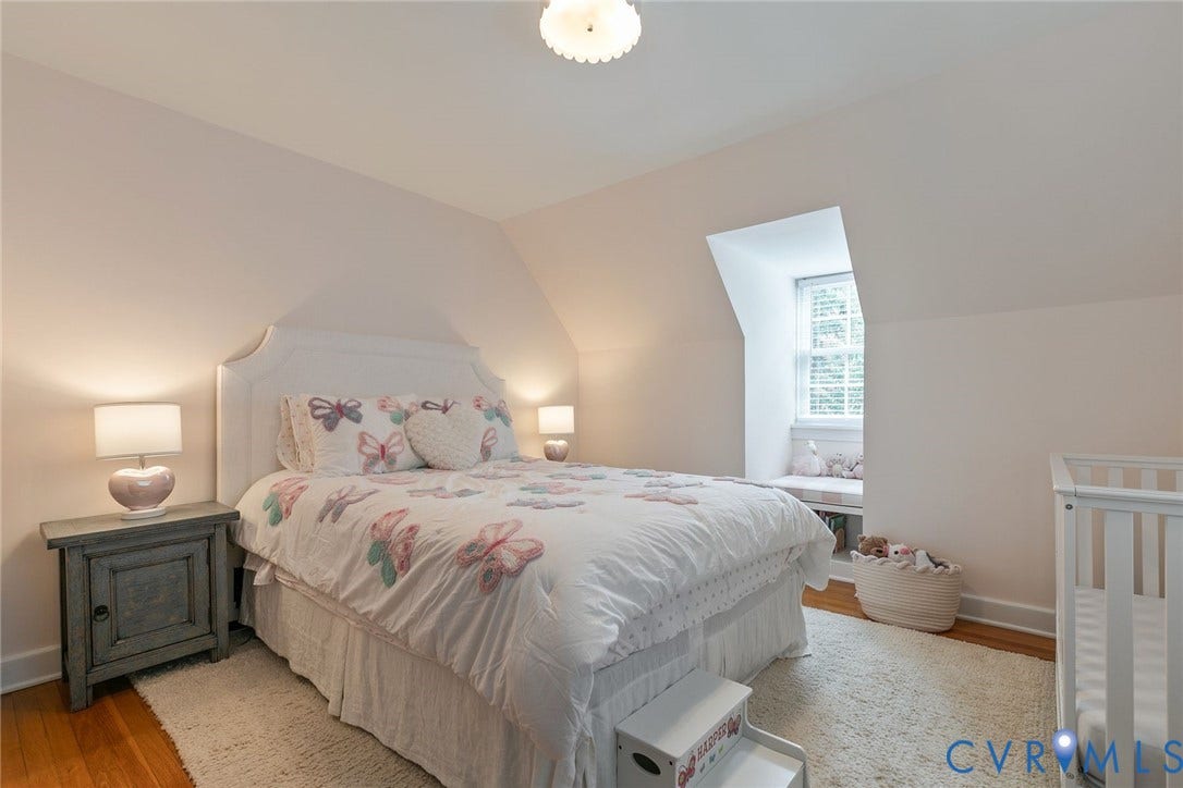 14 Libbie Avenue, Libbie/Grove, Richmond, VA 23226 Bedroom featuring hardwood flooring, sloped ceiling, window with white blinds, and a built-in window seat
