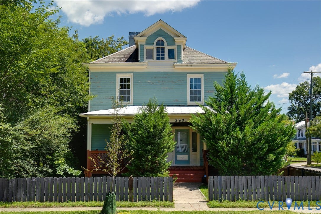 2801 4th Avenue, Richmond, VA 23222 Two-story residence with light blue siding and white trim