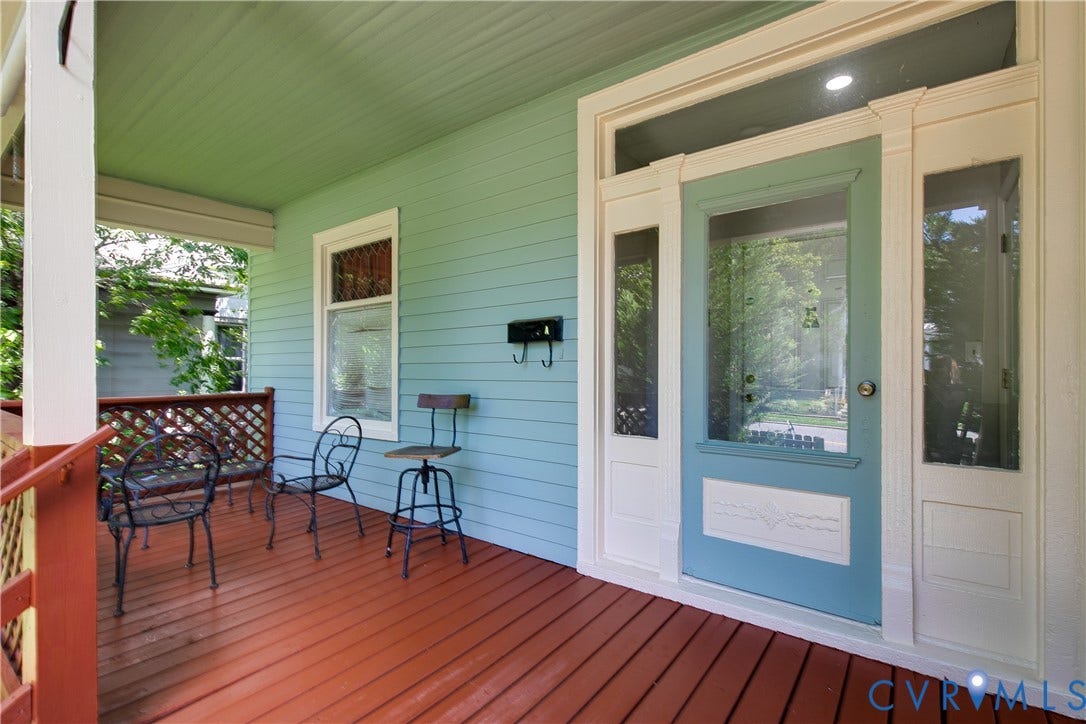 2801 4th Avenue, Richmond, VA 23222 Covered porch with wood-finish flooring and a light blue paneled wall