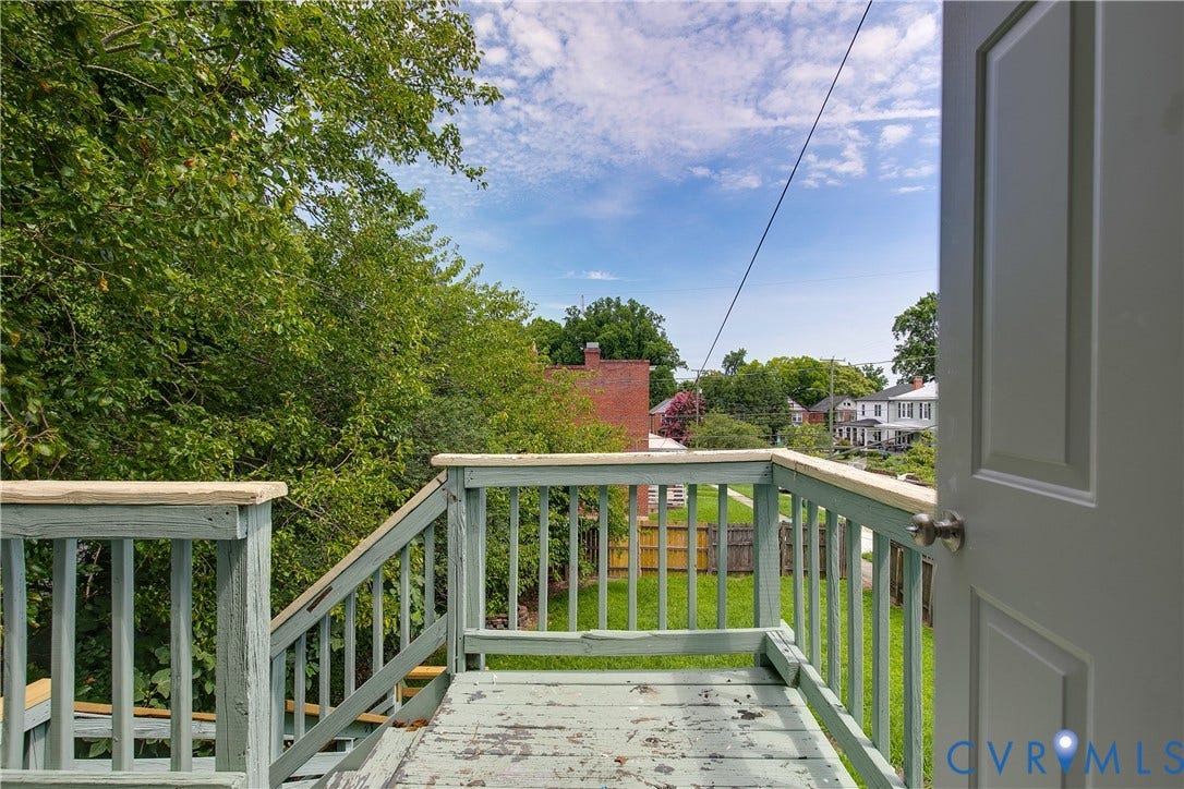 2801 4th Avenue, Richmond, VA 23222 Outdoor deck with painted wood railing and balusters