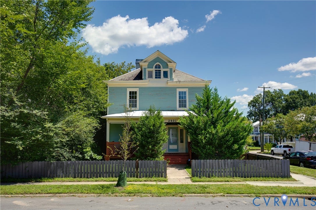 2801 4th Avenue, Richmond, VA 23222 Two-story residence with a dormer window and arched detailing