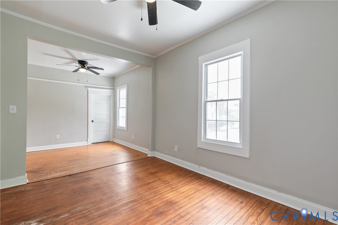 2801 4th Avenue, Richmond, VA 23222 Hardwood flooring extends across an open-concept living area with light gray walls
