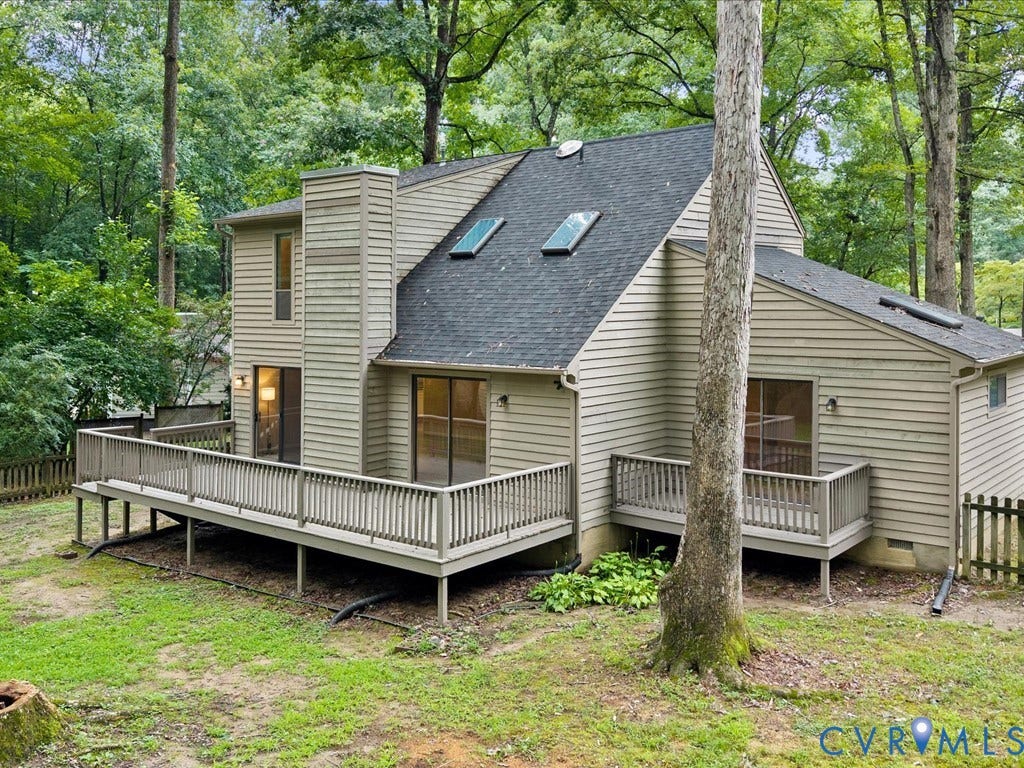 508 Smoketree Place, Chesterfield, VA 23236 Contemporary style home nestled among mature treesiding, a new dark architectural shingle roof with dual skylights, and multiple decks with railings.