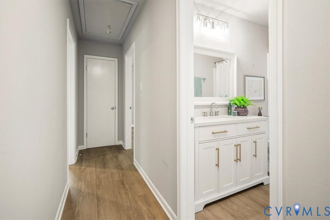 4400 Treely Road, Chesterfield, VA 23831 Hallway featuring wood-finish flooring and light gray wall tones