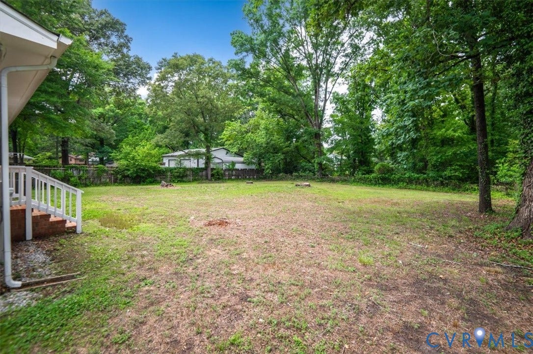 4400 Treely Road, Chesterfield, VA 23831 Expansive backyard featuring mature trees providing natural screening
