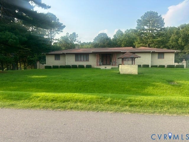 23802 Addison Street, Dinwiddie, VA 23803 Brick rancher on one acre Lot.