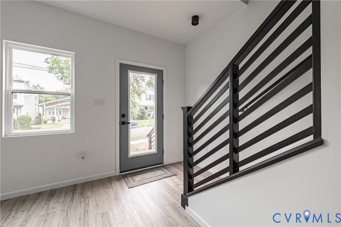 1516 Custer Street, Richmond, VA 23222 Entryway featuring a contemporary black metal stair railing
