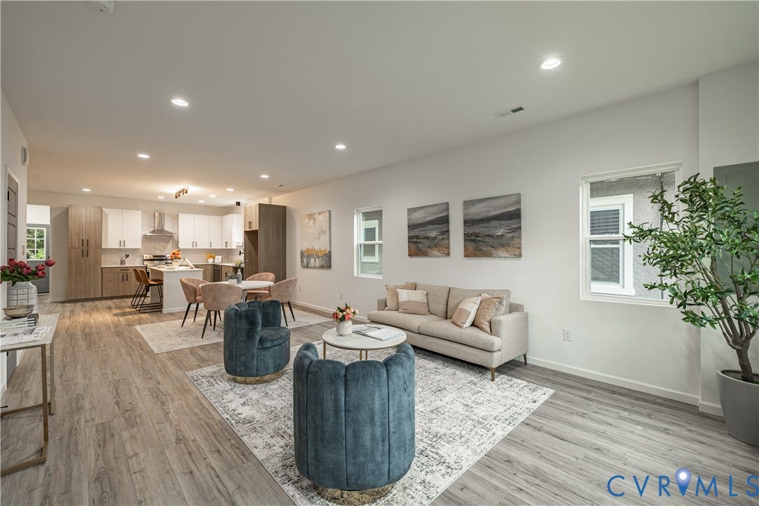 1516 Custer Street, Richmond, VA 23222 Open-concept living space featuring wood-finish flooring, recessed lighting, and bright white walls