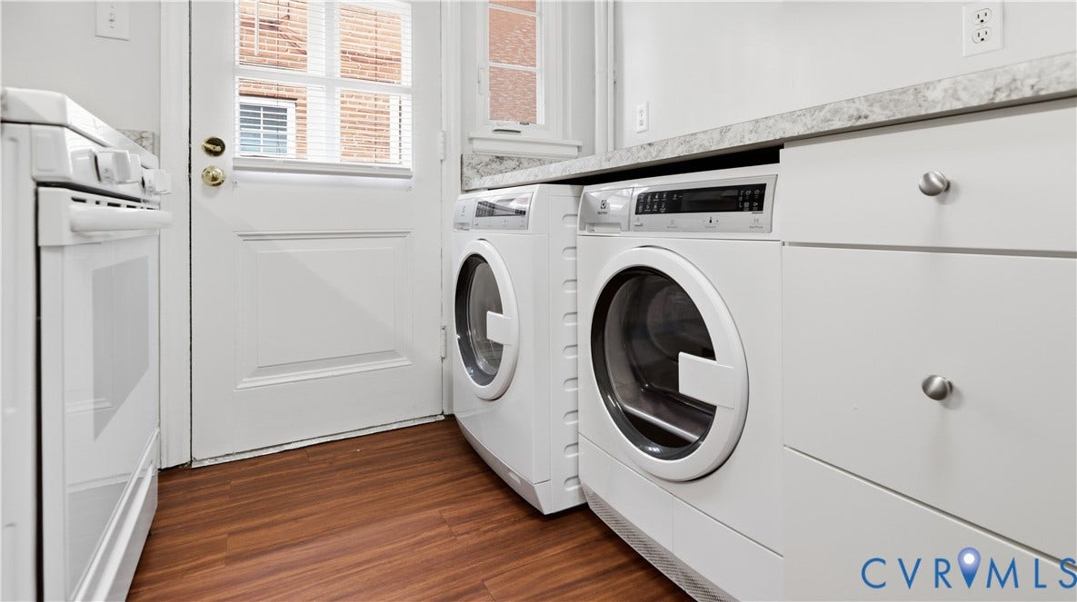 3517 Hanover Avenue, #B, Museum District, Richmond, VA 23221 Integrated laundry appliances, white cabinetry, light-toned countertops, and wood-finish flooring