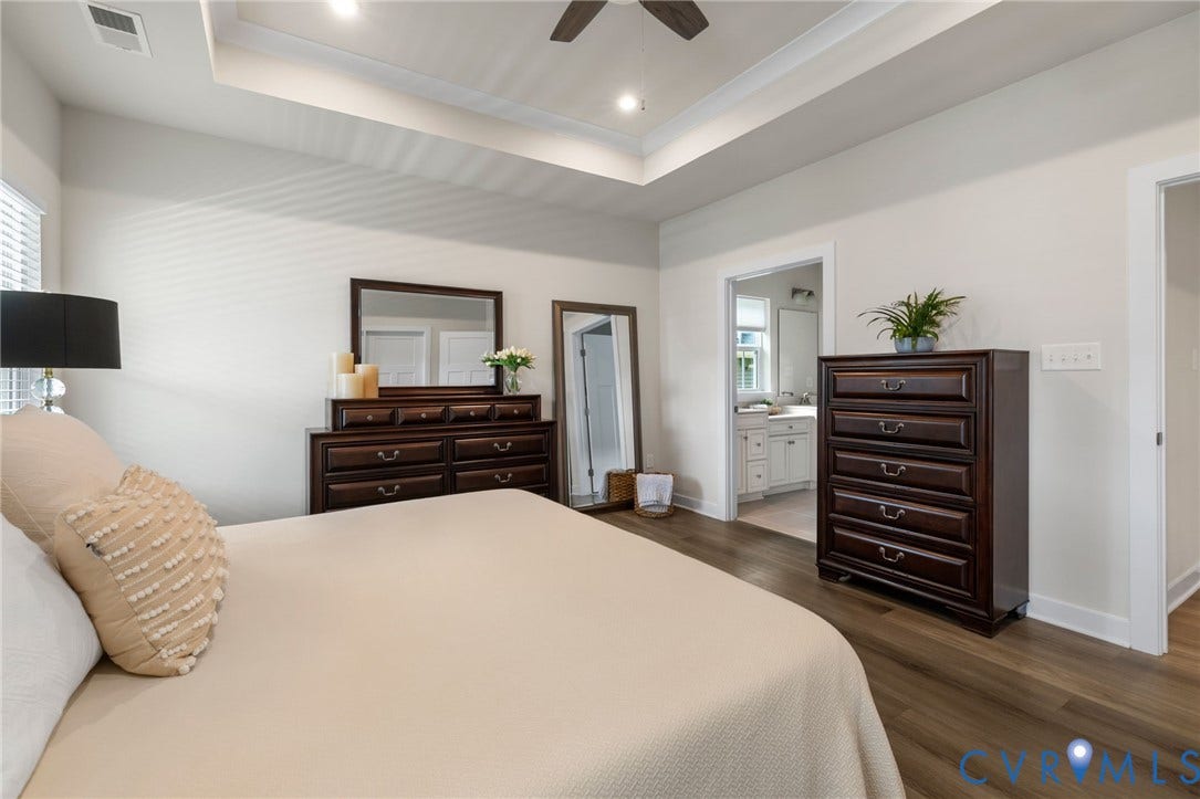 6249 Deer Summit Court, Charleston Club, Moseley, VA 23120 Tray ceiling with recessed lighting and a ceiling fan, wood-finish flooring, and en suite bathroom