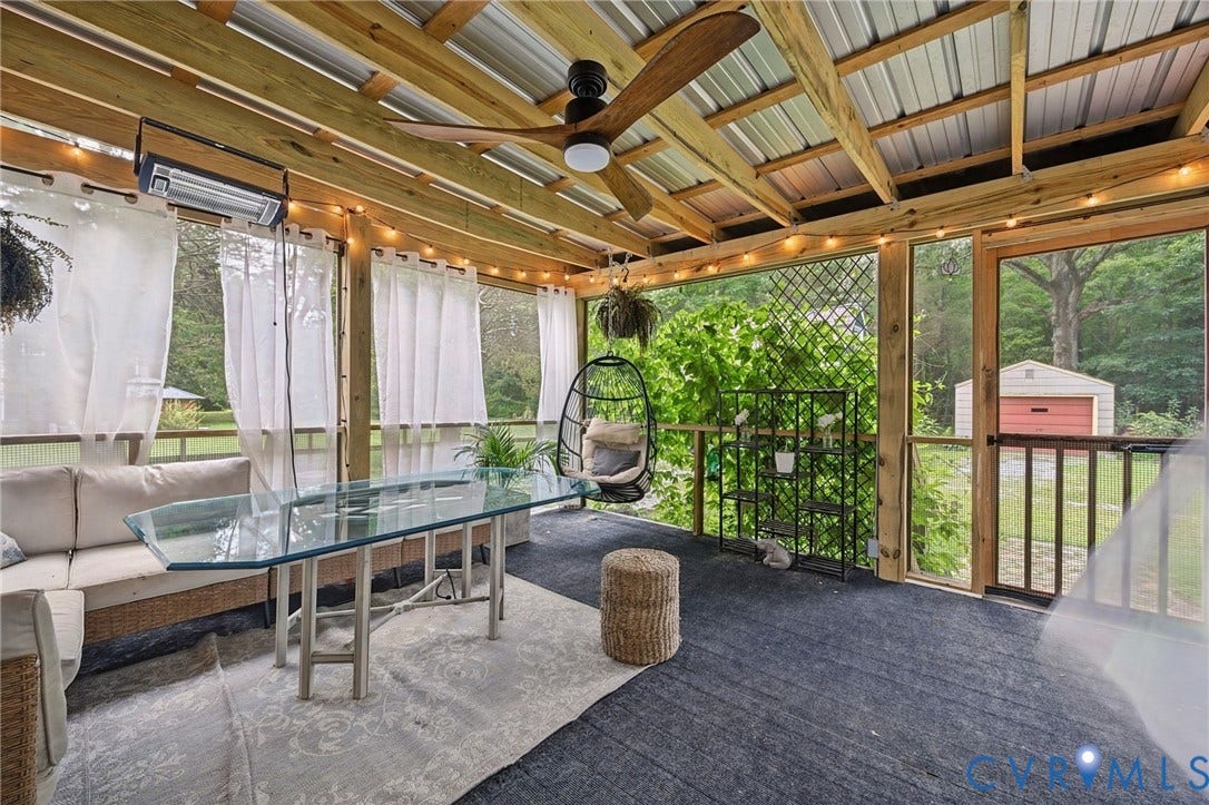 3633 Darbytown Court, Henrico, VA 23231 Screened porch with exposed wood beam ceiling, metal roof, and ceiling fan