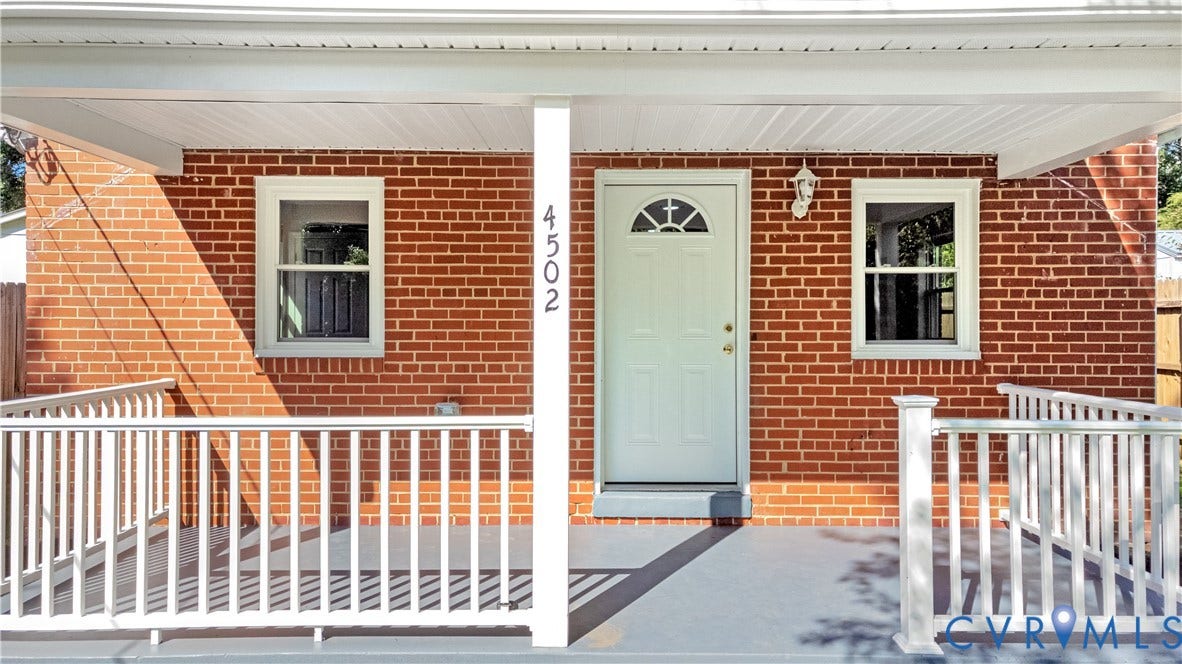 4502 Bunn Avenue, Fulton, Richmond, VA 23231 Brick exterior featuring a covered porch with white railings and columns