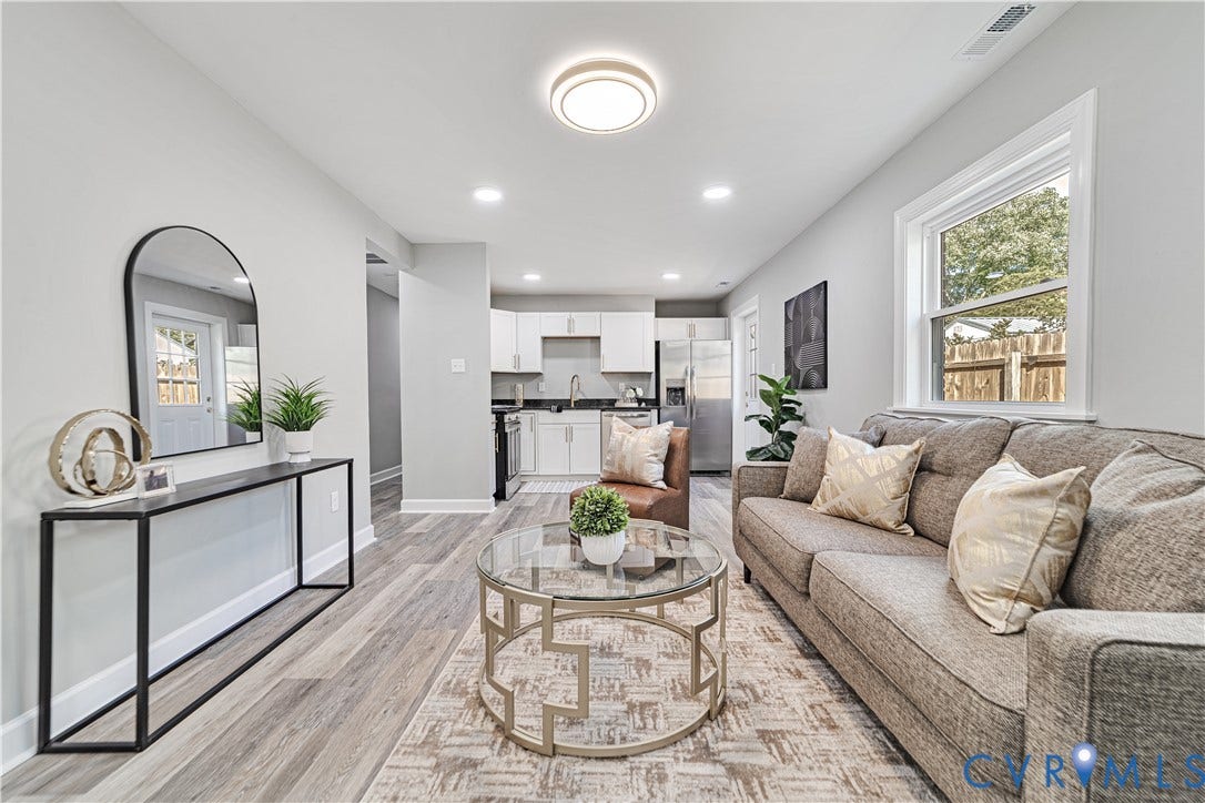 4502 Bunn Avenue, Fulton, Richmond, VA 23231 Open-concept living space featuring wood-finish flooring, recessed lighting, and a neutral wall palette