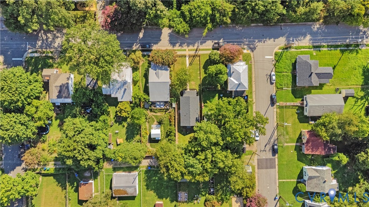 4502 Bunn Avenue, Fulton, Richmond, VA 23231 Aerial perspective of a residential neighborhood featuring several homes with various rooflines and surrounding green spaces