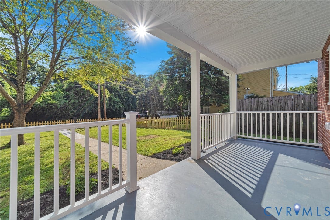 4502 Bunn Avenue, Fulton, Richmond, VA 23231 Covered porch featuring white railings and support posts, a painted concrete floor, and a white ceiling