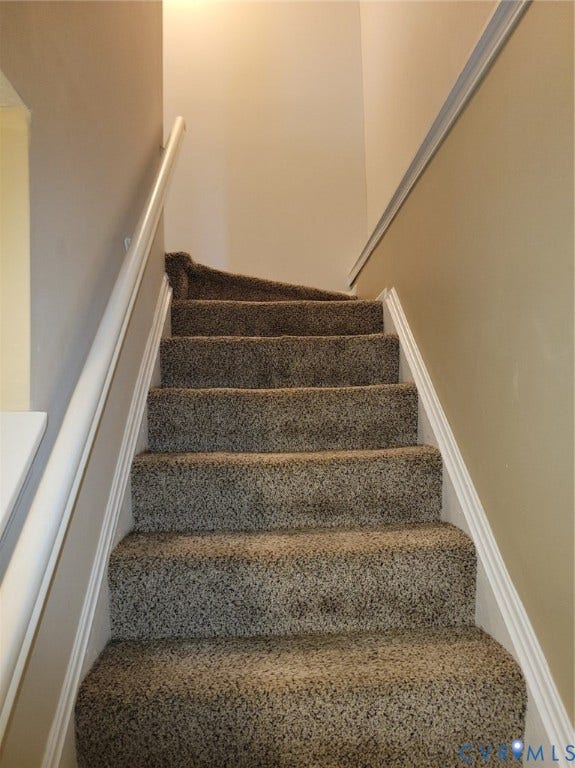 4900 Finnegan Court, Henrico, VA 23228 Carpeted staircase with white trim and handrail