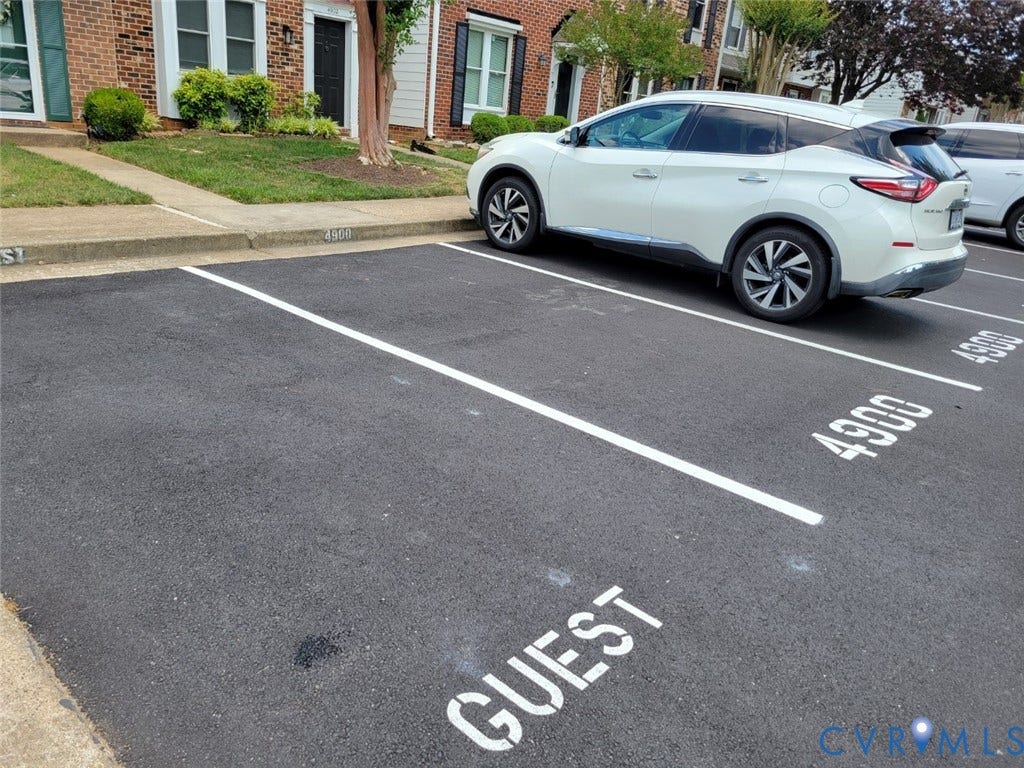 4900 Finnegan Court, Henrico, VA 23228 Paved parking area featuring designated and guest parking