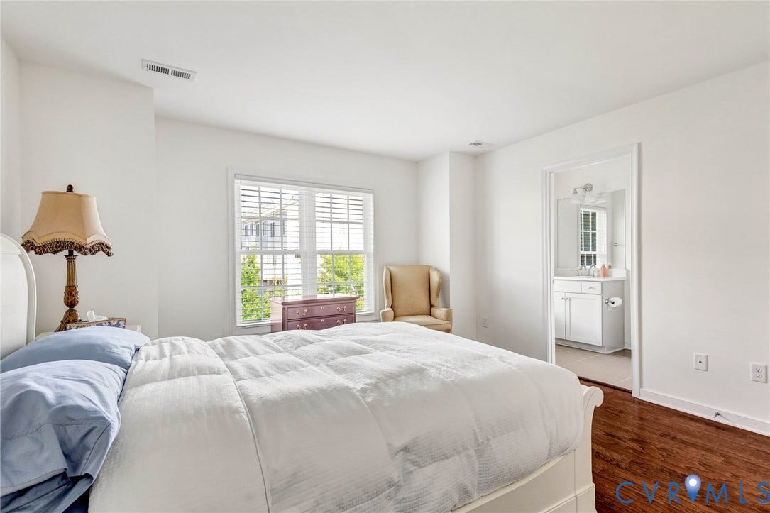 14379 Michaux Village Drive, Winterfield Park, Midlothian, VA 23113 Bright interior space with wood-finish flooring and a white color palette