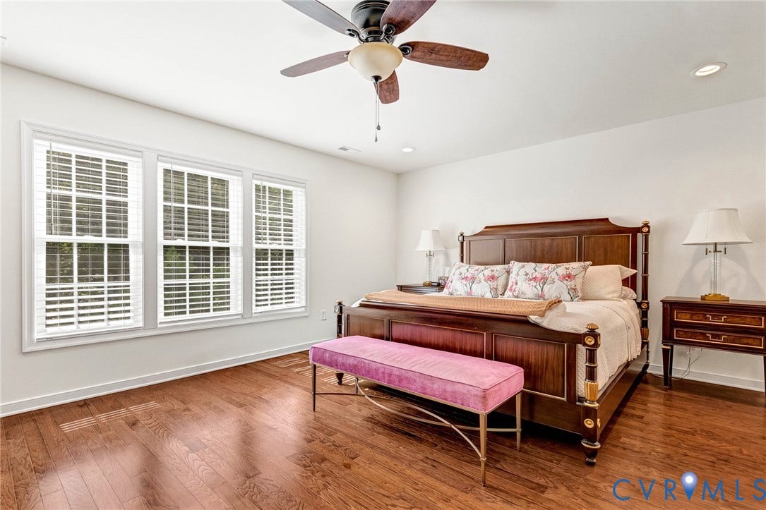 14379 Michaux Village Drive, Winterfield Park, Midlothian, VA 23113 Spacious room featuring rich wood-finish flooring, a ceiling fan with integrated lighting, and recessed ceiling lights