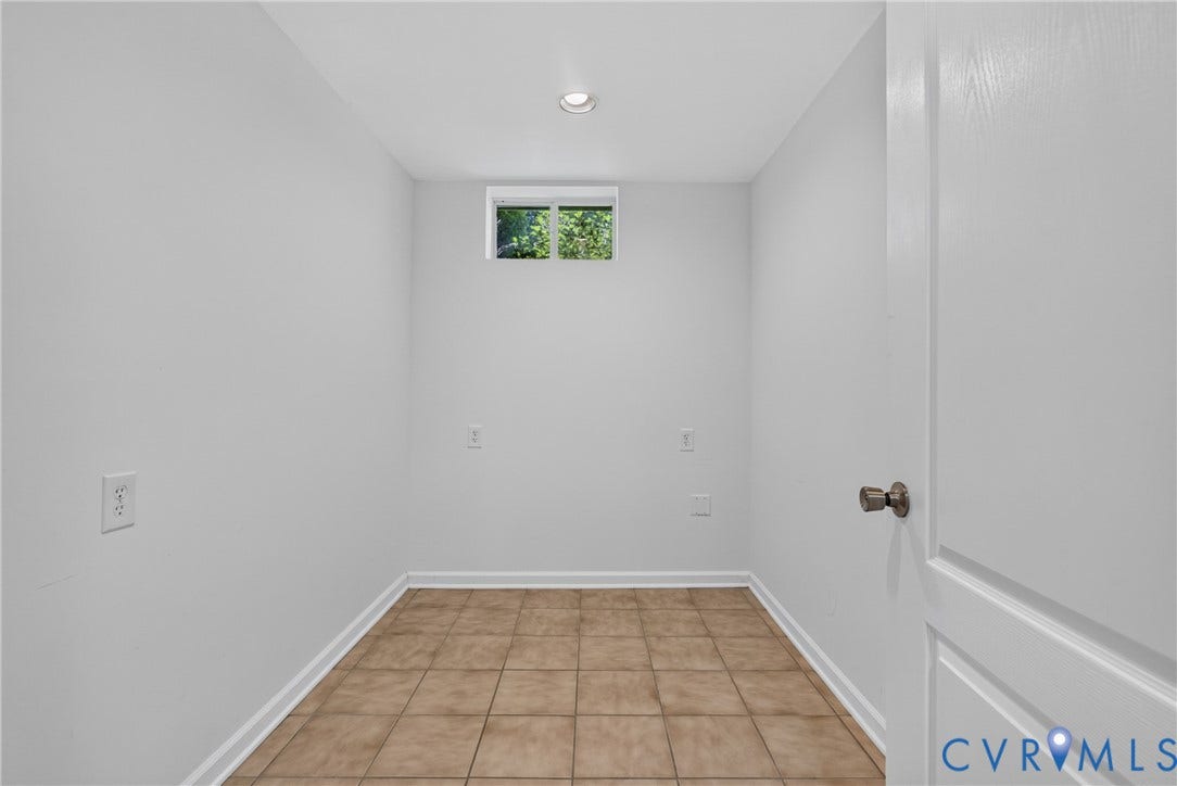 381 Shorewood Drive, Shorewood, Mineral, VA 23117 Basement - Utility space featuring light gray painted walls, tiled flooring, - perfect for a freezer room