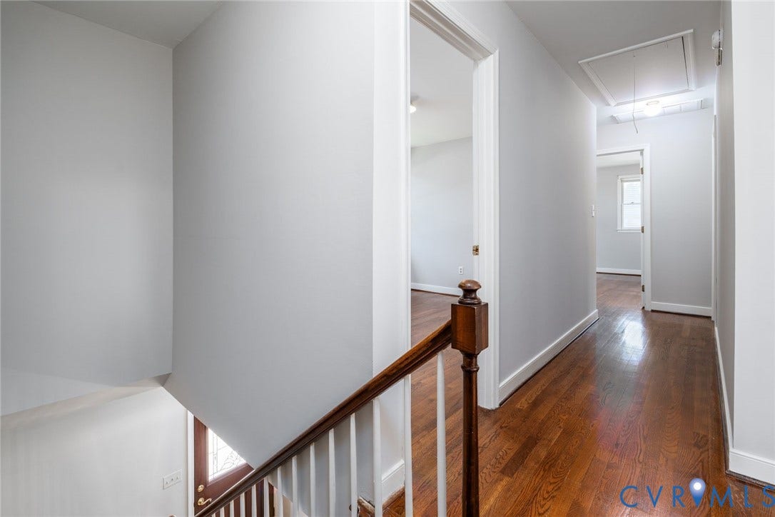 14613 Gimbel Drive, Chester, VA 23836 Hardwood flooring, painted walls, white trim, wood handrail, and white balusters